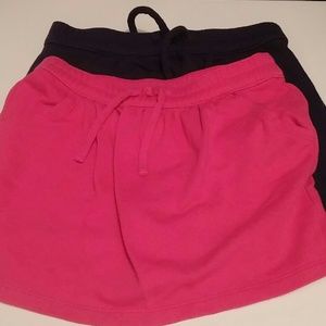 Pink and navy skirts